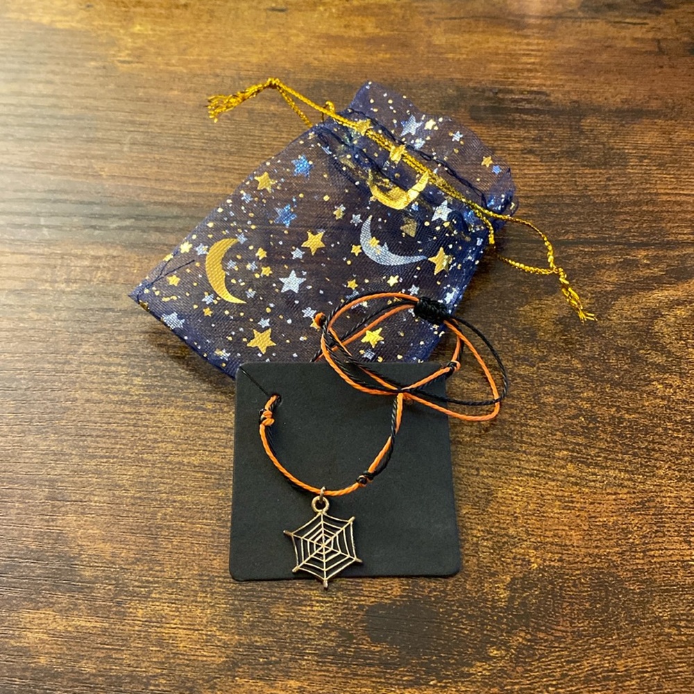 Spiderweb adjustable cord pull tie bracelet